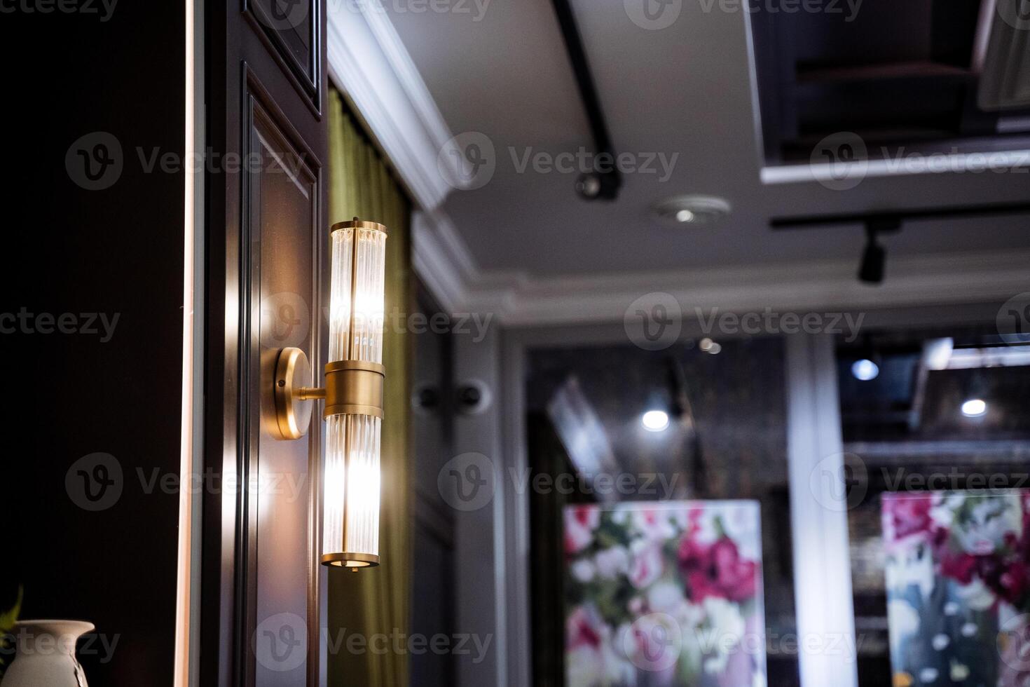 A close up of a wall mounted lamp photo