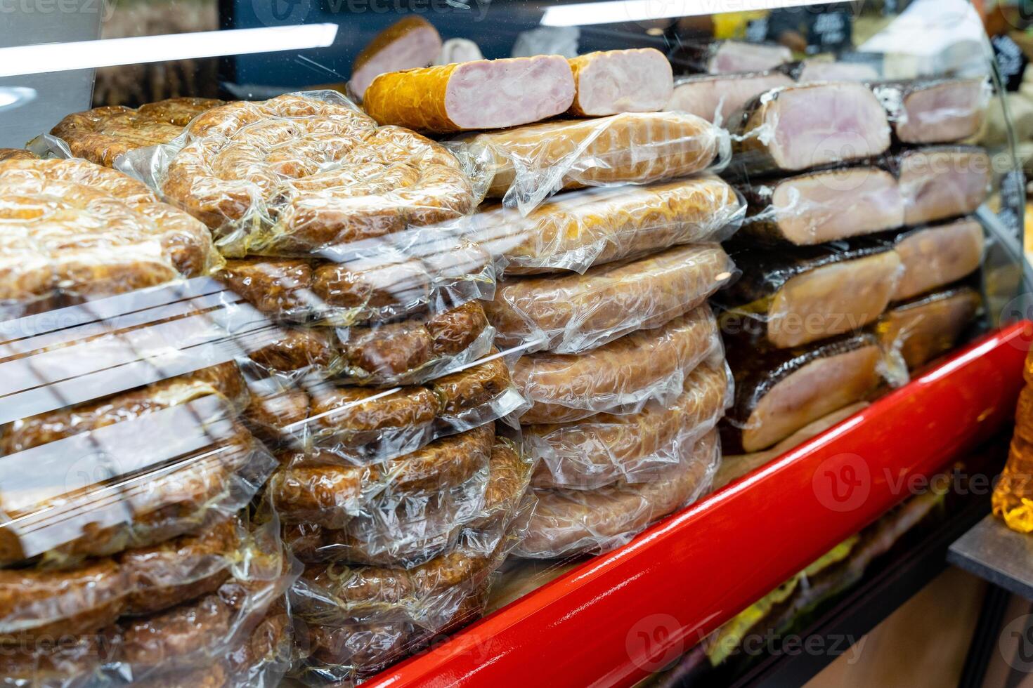 A display case filled with meat photo