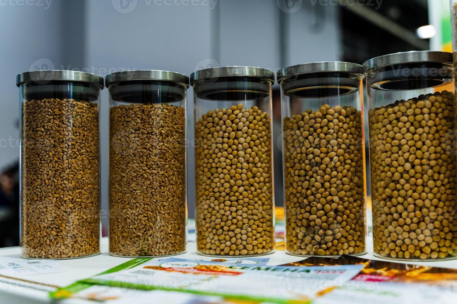 A row of jars filled with food on a table photo