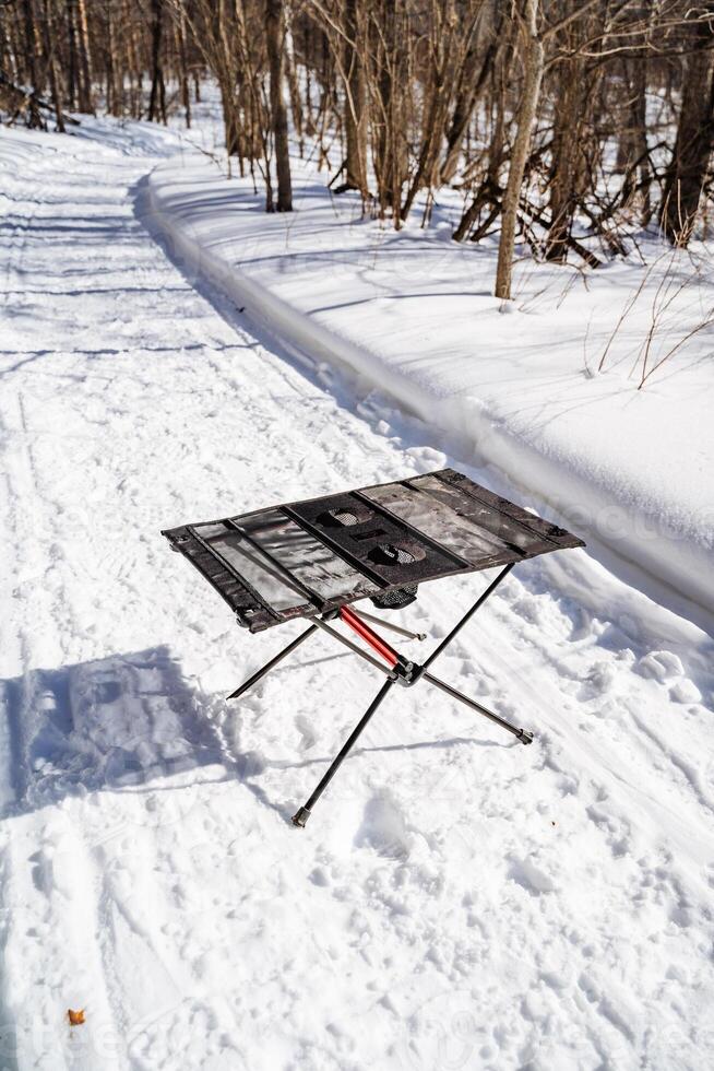 A table on a snow covered path photo