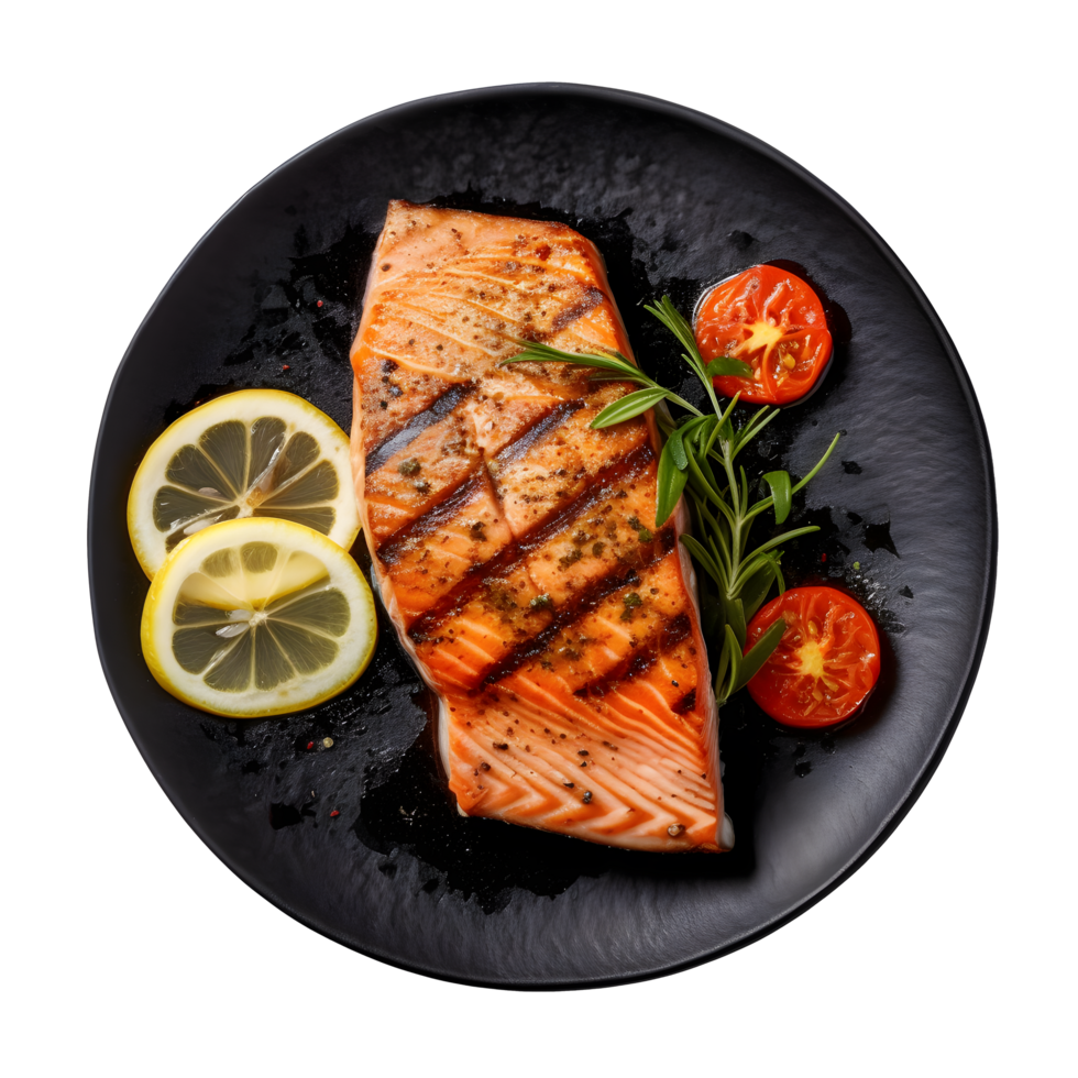grilled salmon steak on black plate with lemon and rosemary png