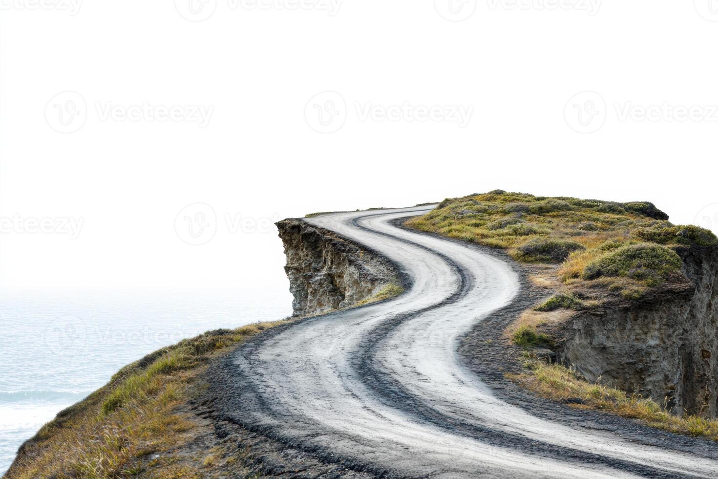 Cliffside coastal roadway winding along ocean cliff edge in natural landscape photo