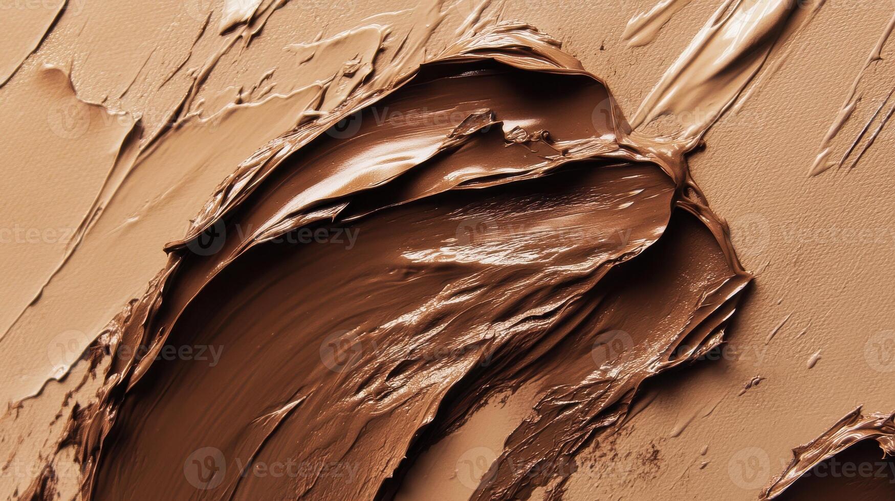 Close-up of brown cream texture on surface for cosmetology and art concepts photo