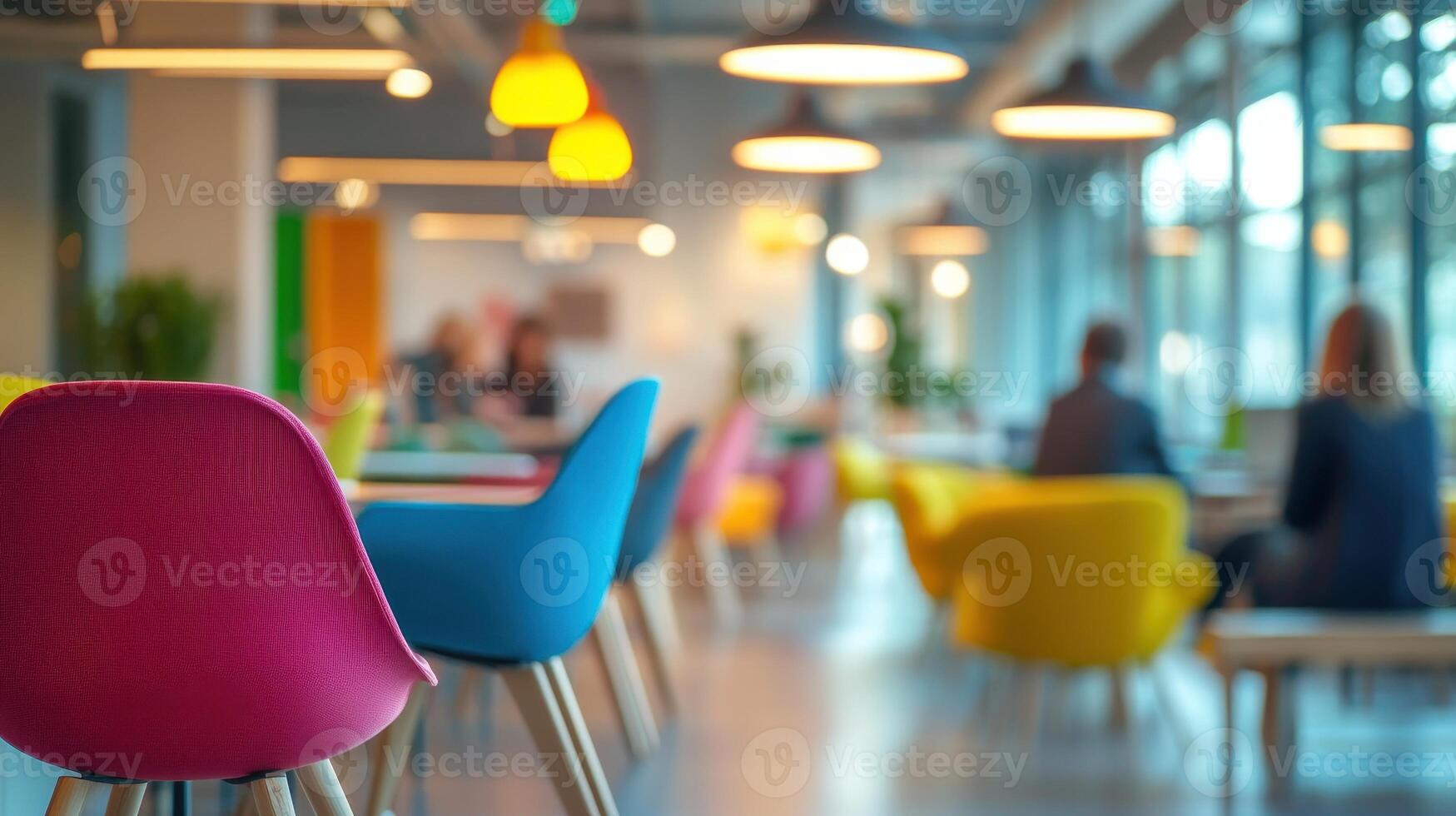 Vibrant co-working space with colorful chairs and modern interior design photo