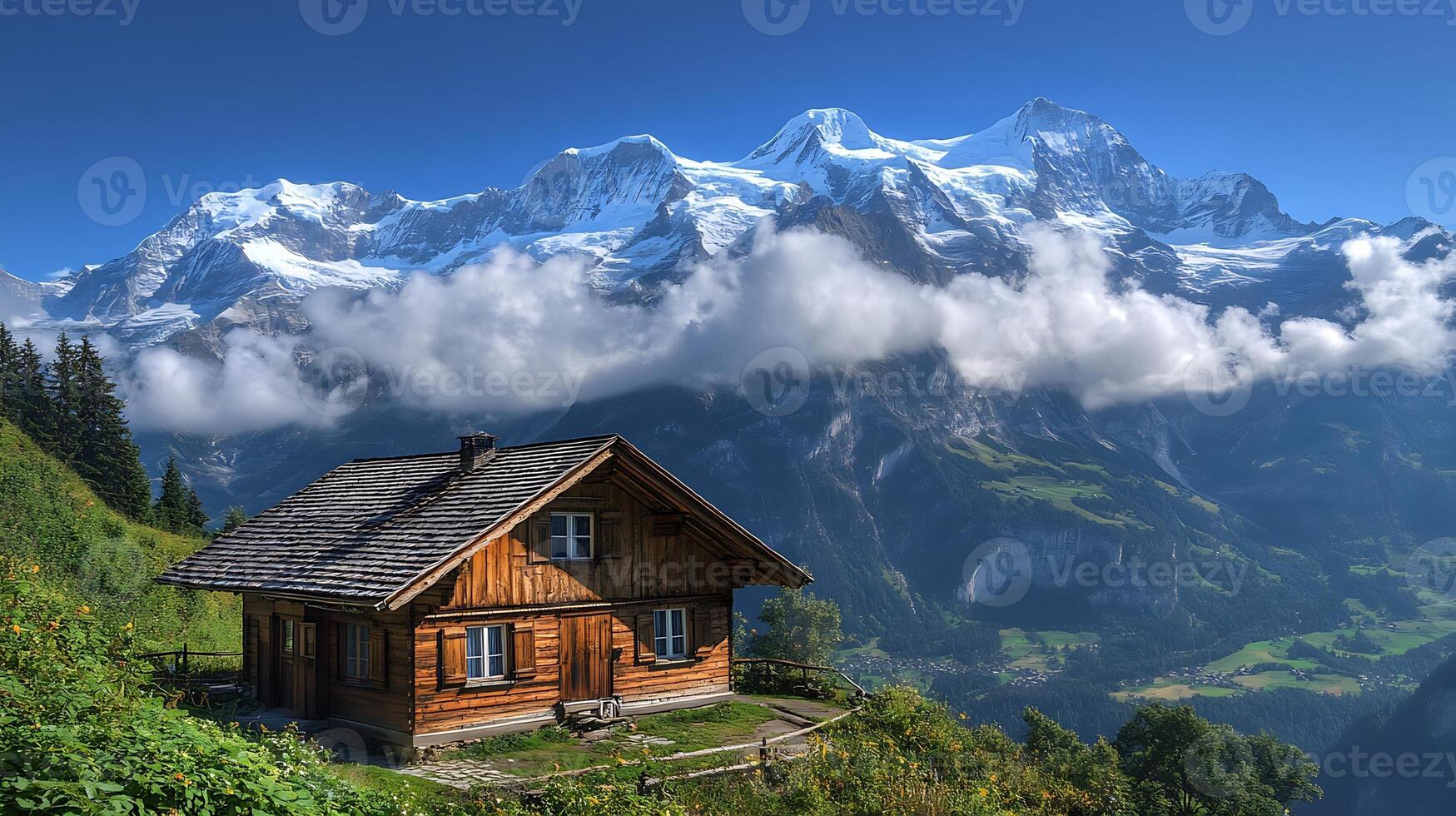 A Mountain Retreat Beneath Snow-Capped Peaks and Floating Clouds photo