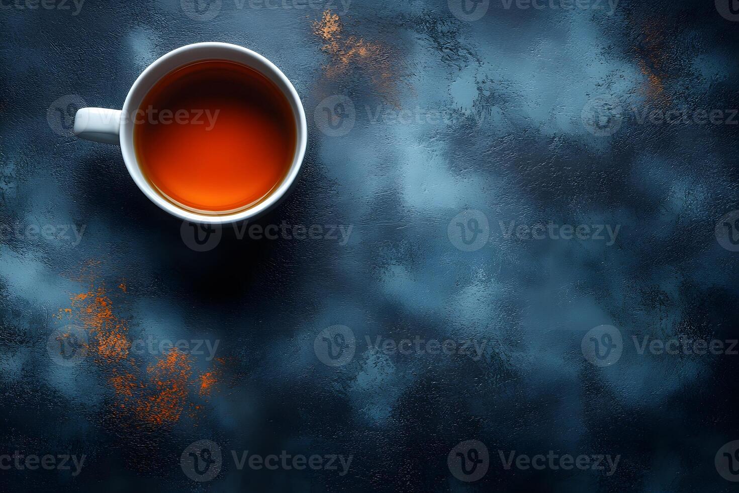 Serene Tea Ritual on Rustic Blue Surface for Relaxation and Contemplation photo