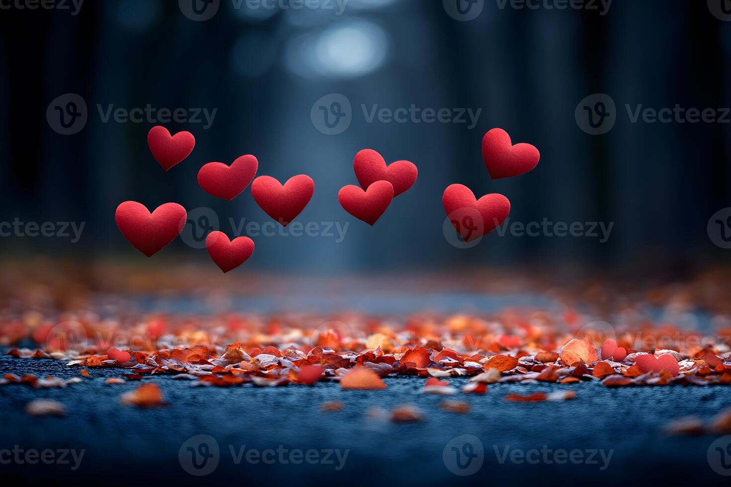 Romantic Autumn Mood with Floating Hearts on Leaf-Covered Pathway photo