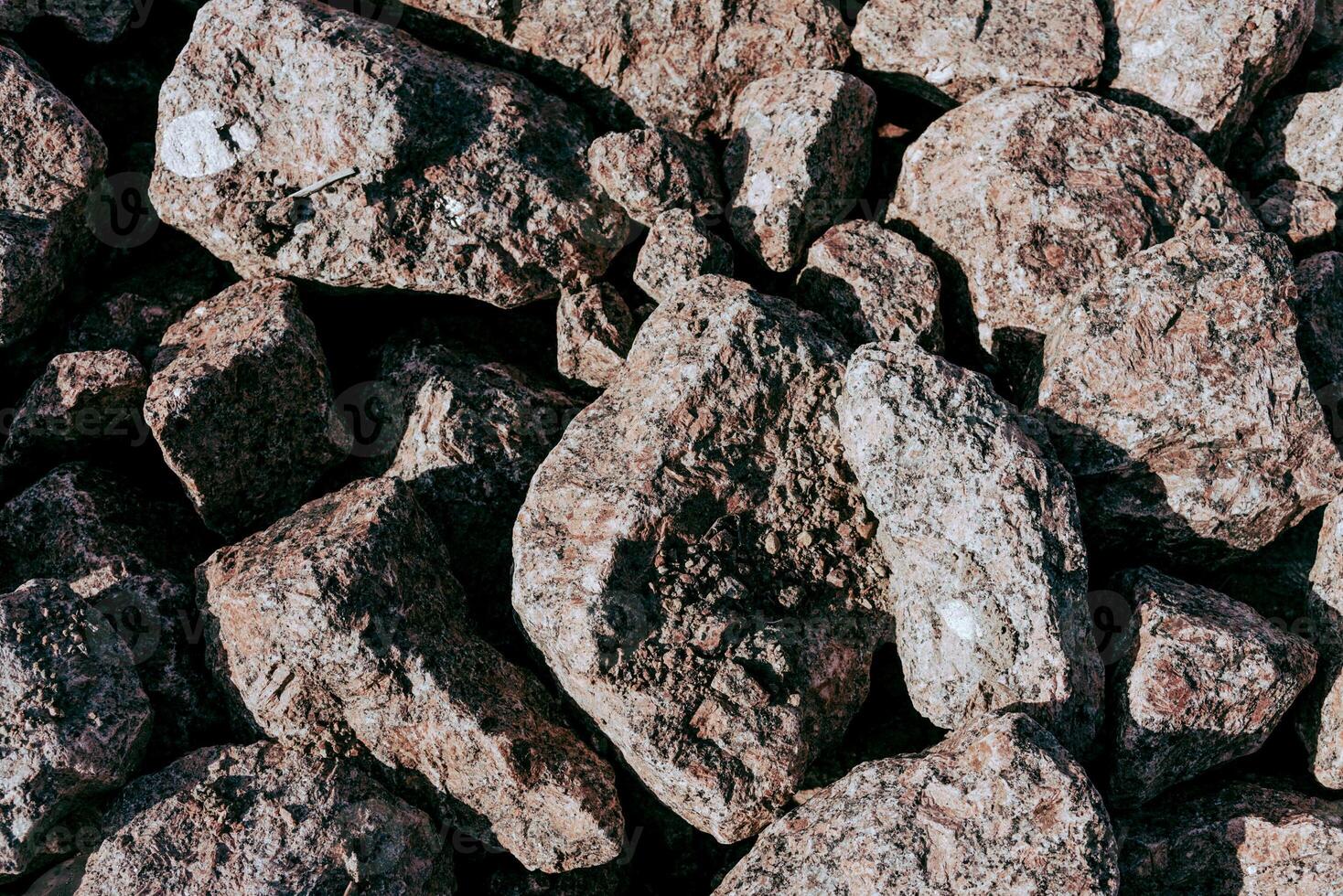Natural nice stone texture with cracks, vegetation and dirt, texture background photo