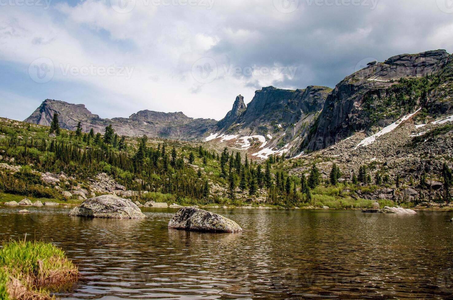 Landscape of Siberia sightly Ergaki mountains, mountain range in haze summer photo