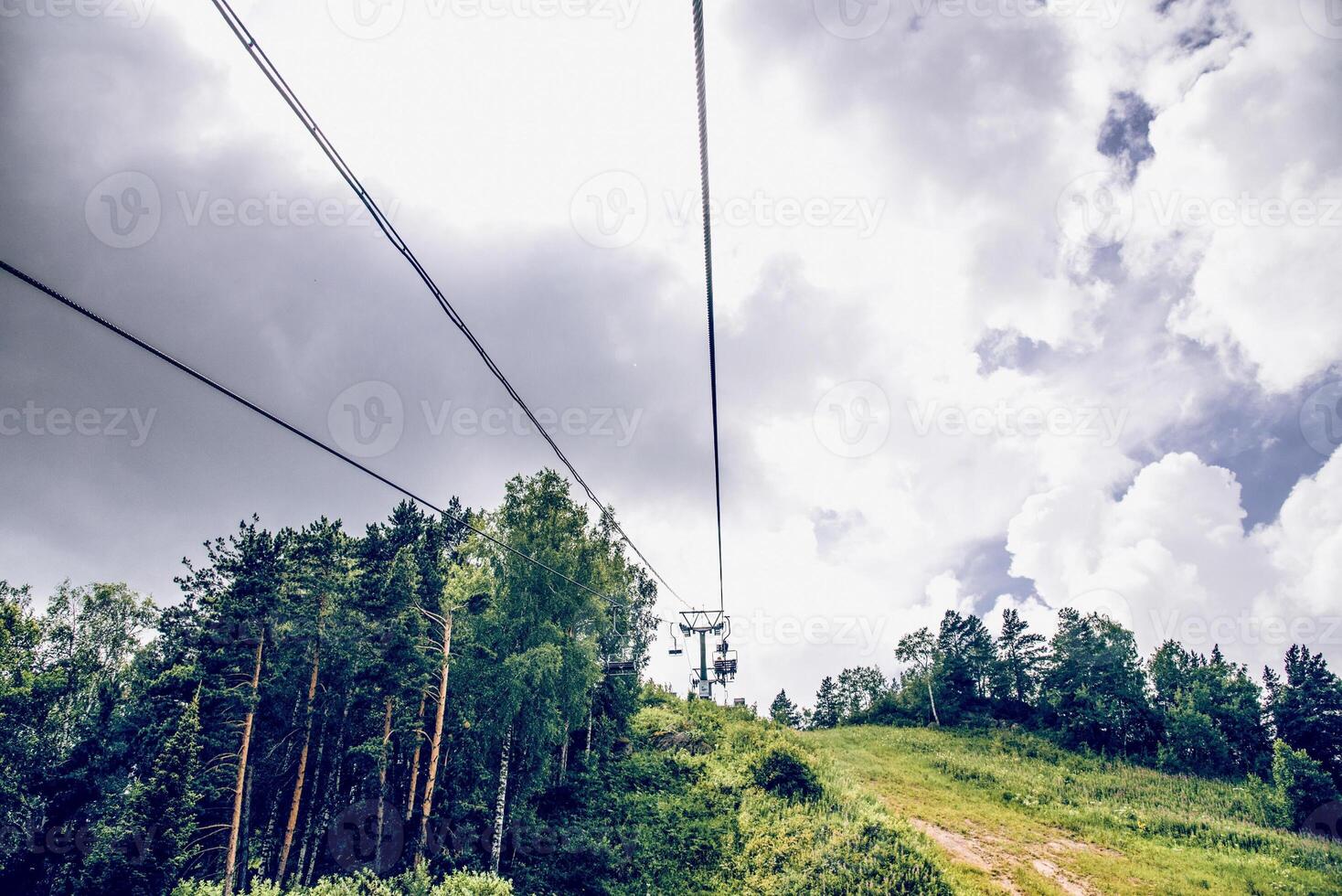 Landscape of snowy beautiful Siberia mountains, mountain range in haze summer photo