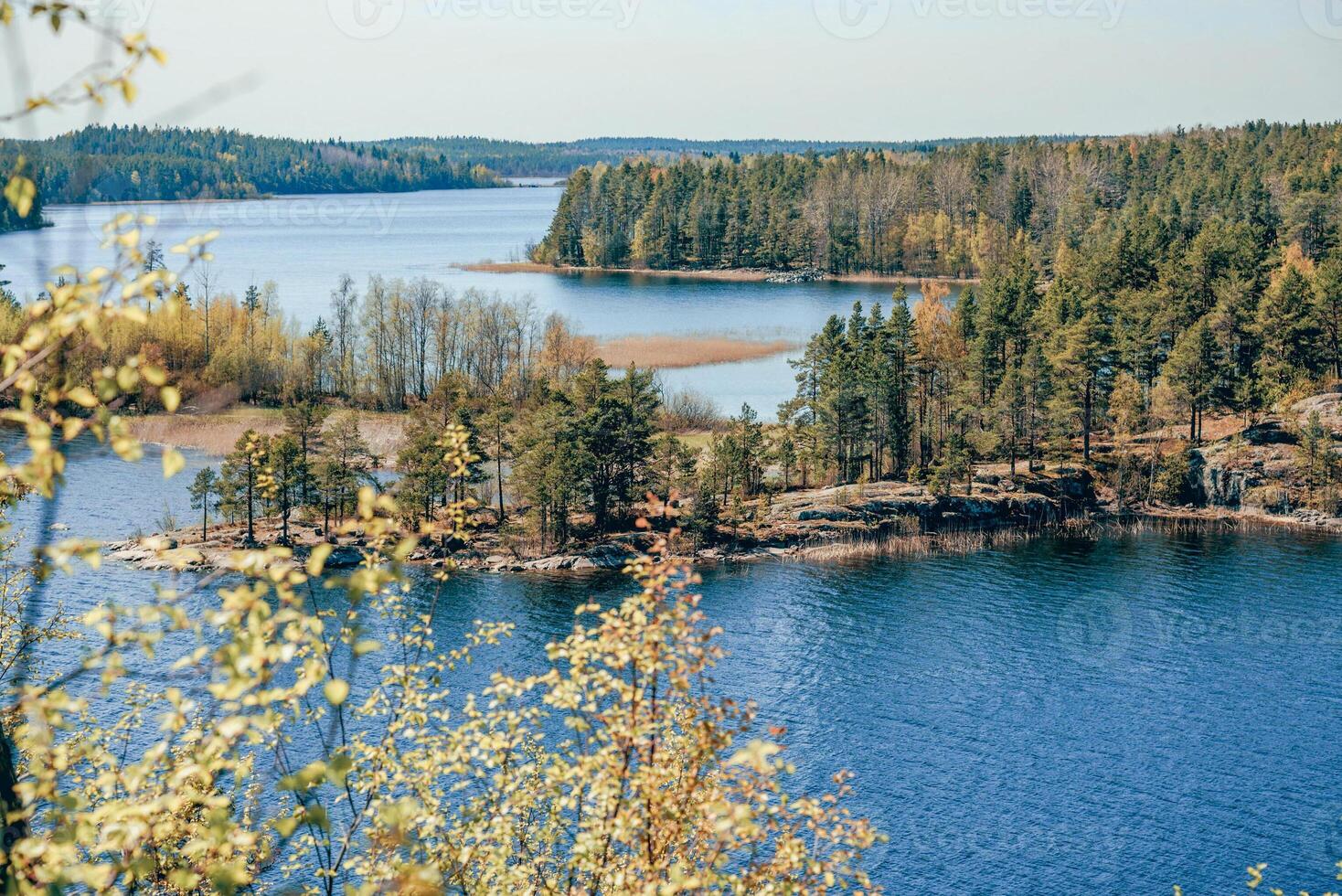 Landscape blue deep lake lovely light sun, clouds sky mountains Ladoga skerries Karelia photo