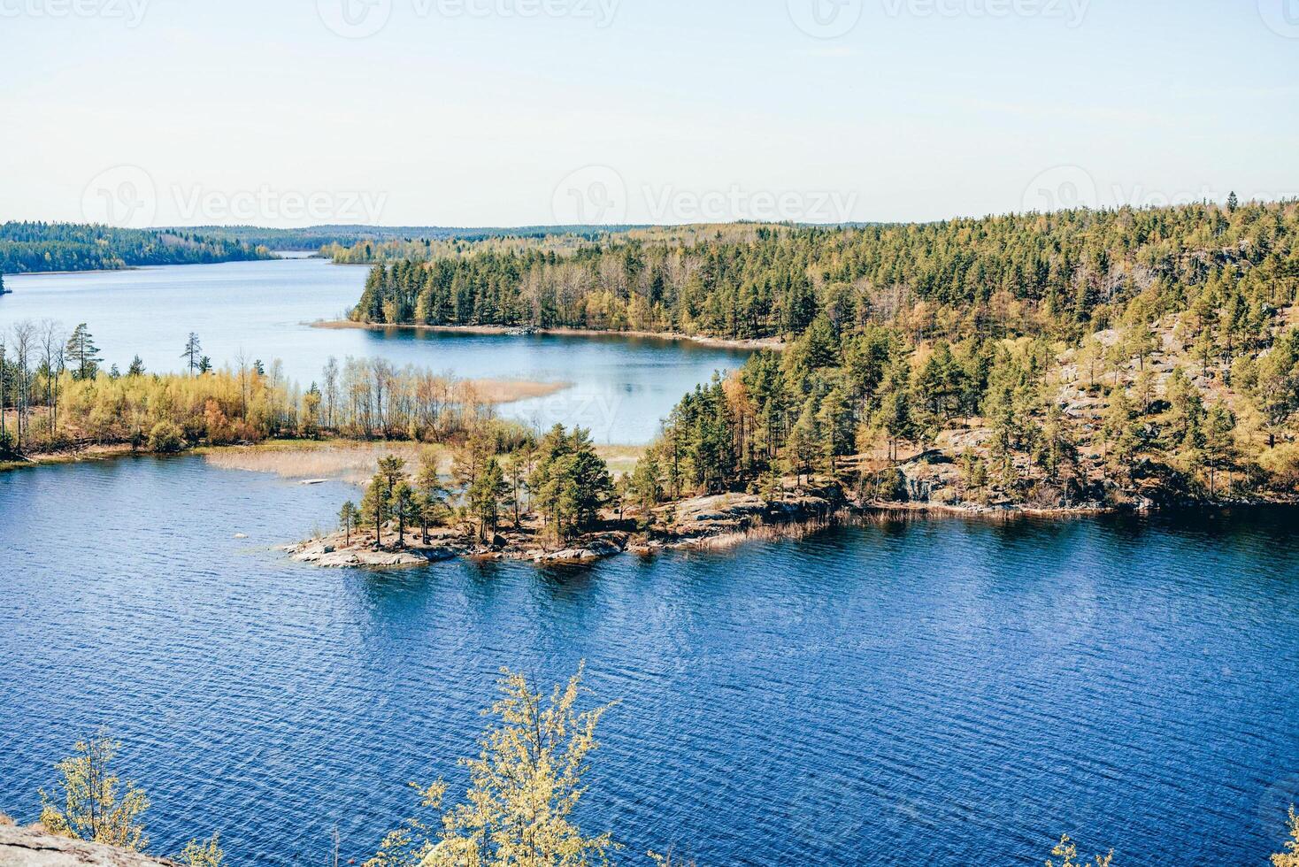 Landscape blue lovely deep lake light sun, clouds sky mountains Ladoga skerries Karelia photo