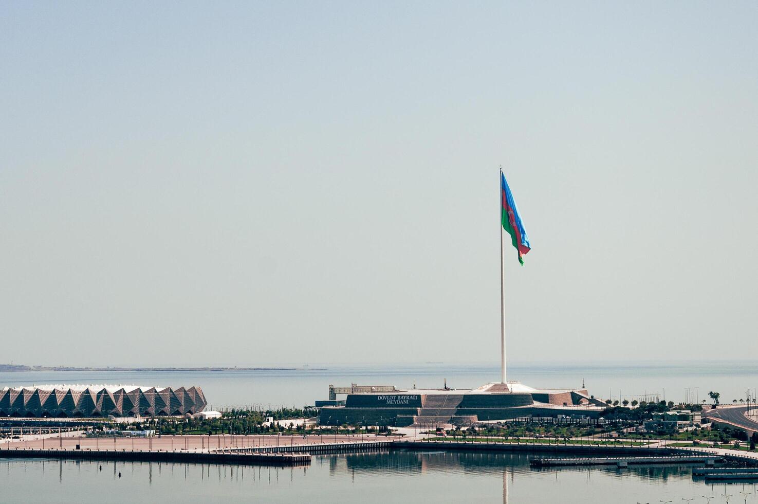Baku, Azerbaijan, August 2016, View of the Caspian Sea embankment and state flag photo