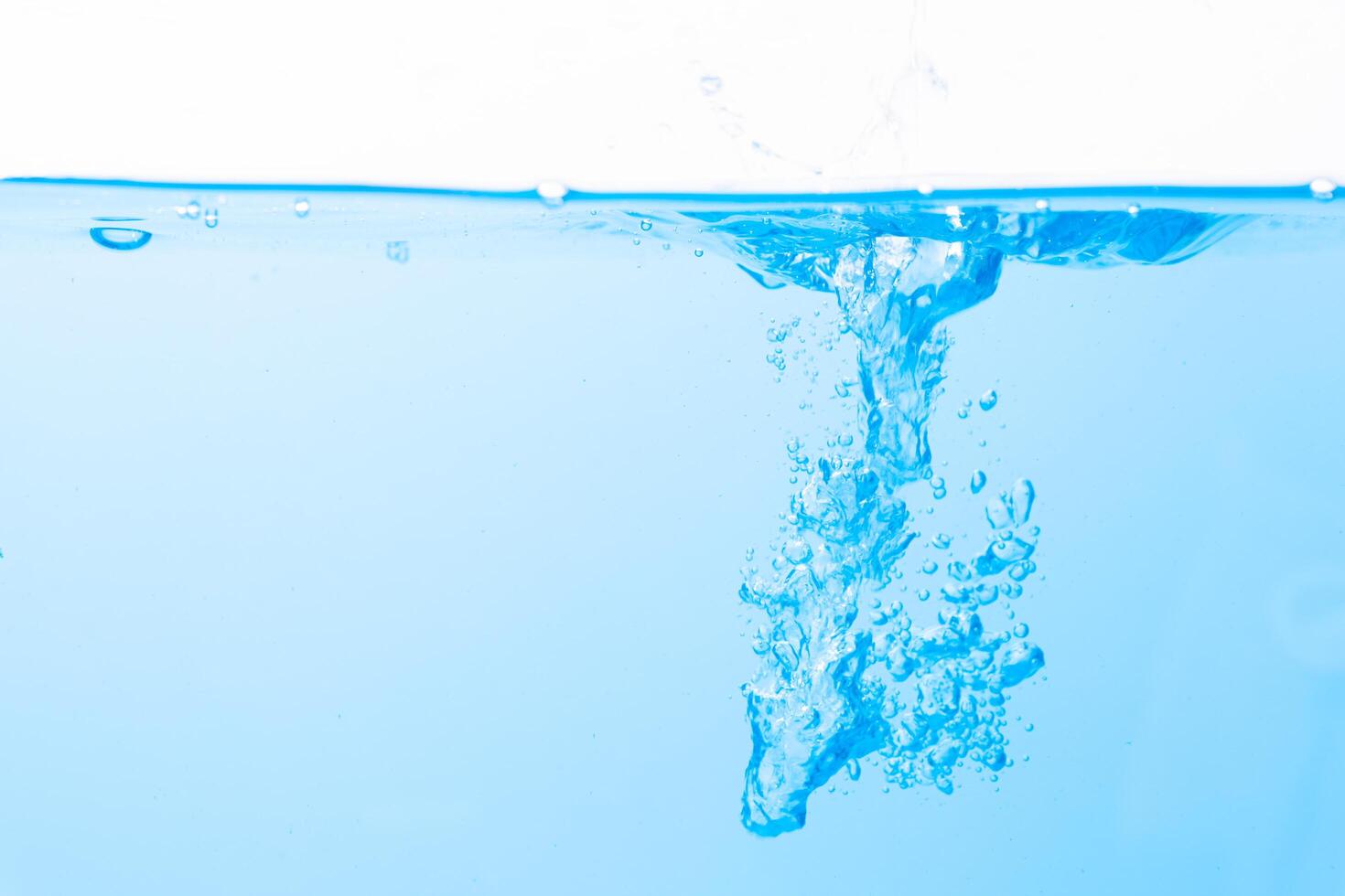 Water droplets on the water surface and bubbles photo