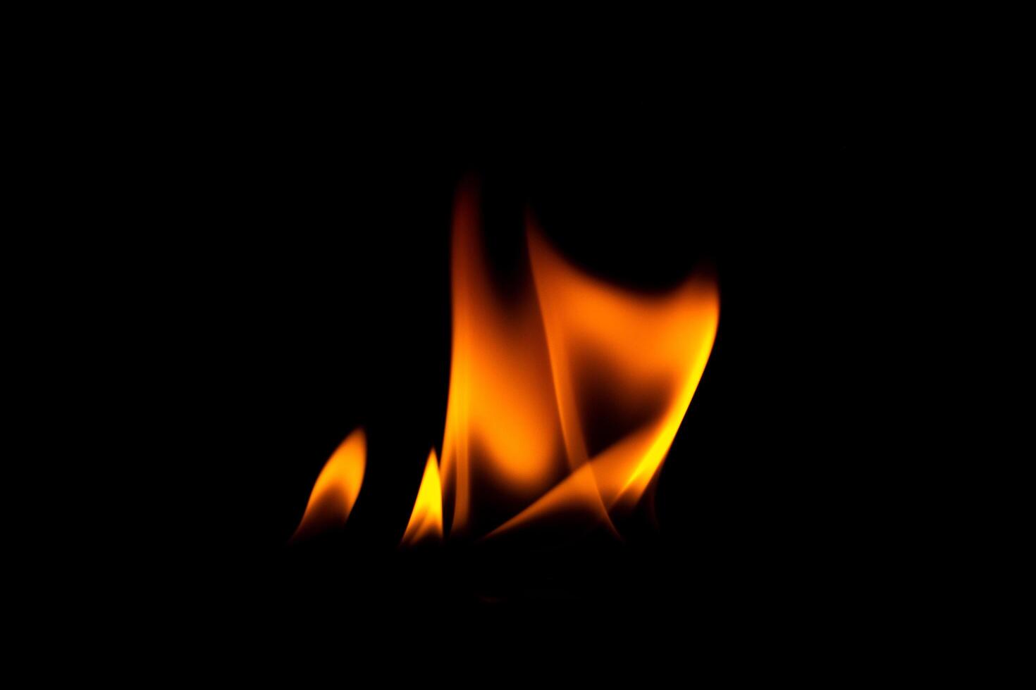 Close-up shot of flame on black background photo