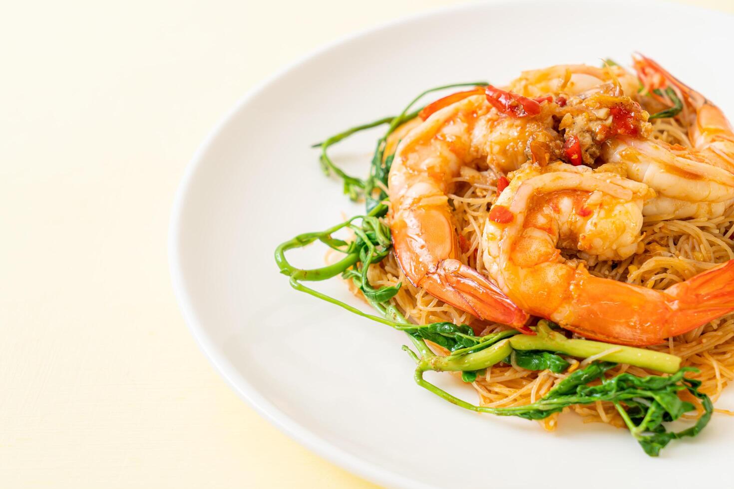 Stir-fried rice vermicelli and water mimosa with shrimps photo