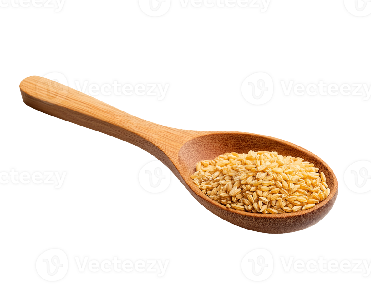 wooden spoon filled with golden rice grains on isolated background for food and ingredient concepts png