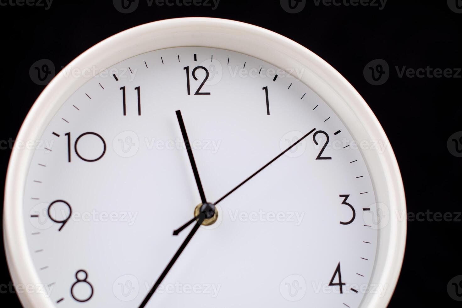 Clock telling time, hand of time stopped, studio shot photo