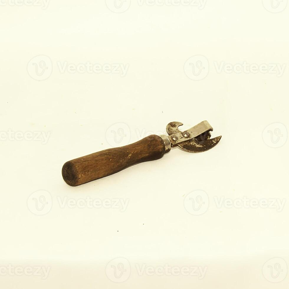 A Vintage Hand Tool with a Wooden Handle and durable Metal Attachment for various crafts photo