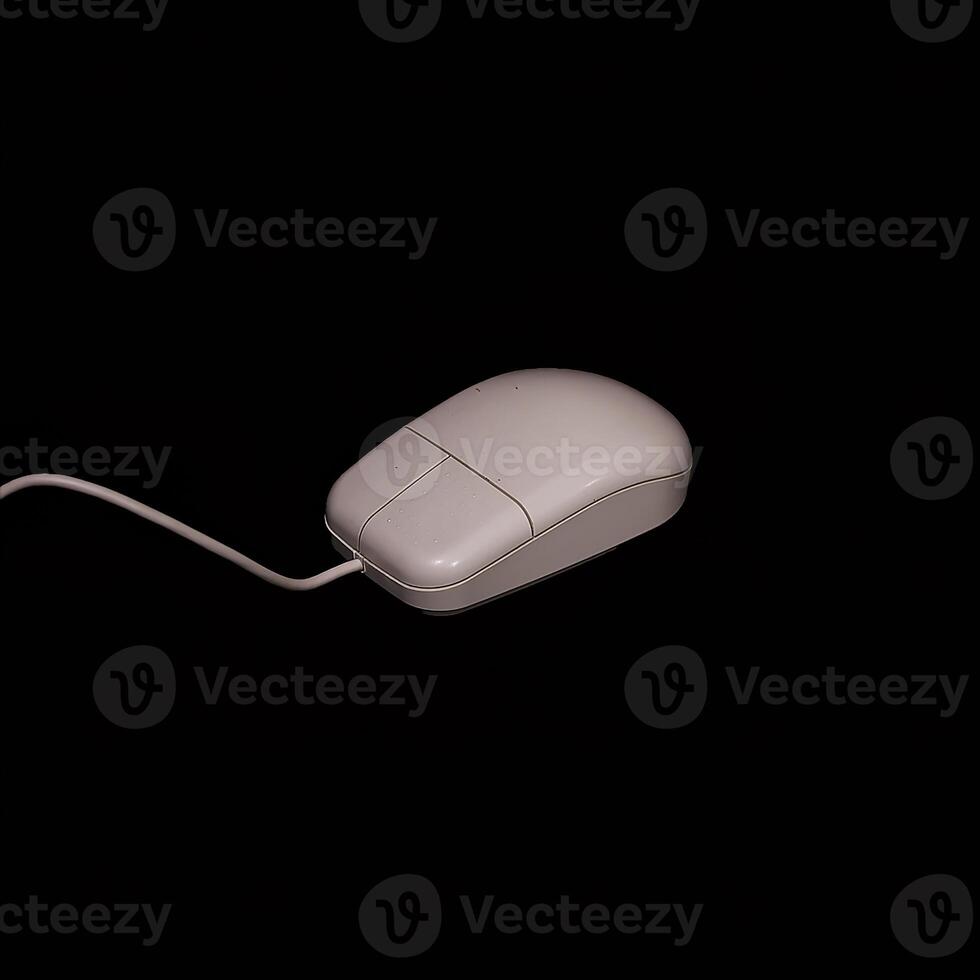 This is a Classic Computer Mouse beautifully displayed on a Black Background for emphasis photo