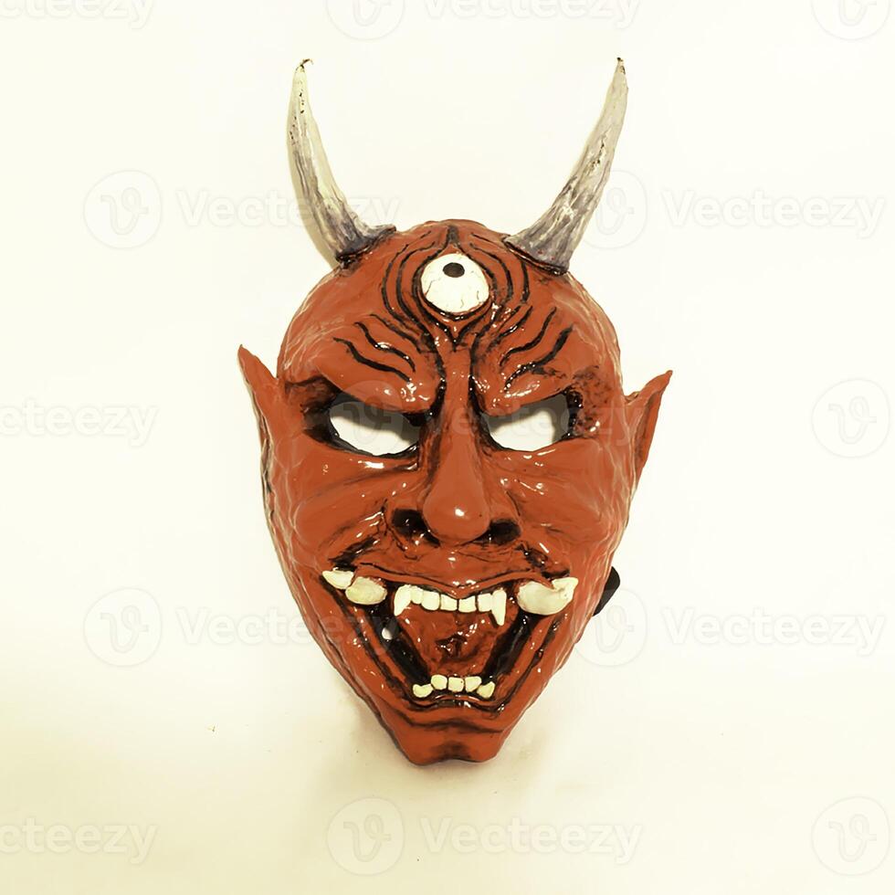 A beautifully crafted Demonic Mask Art featuring Horns and a Fierce Expression that captivates photo