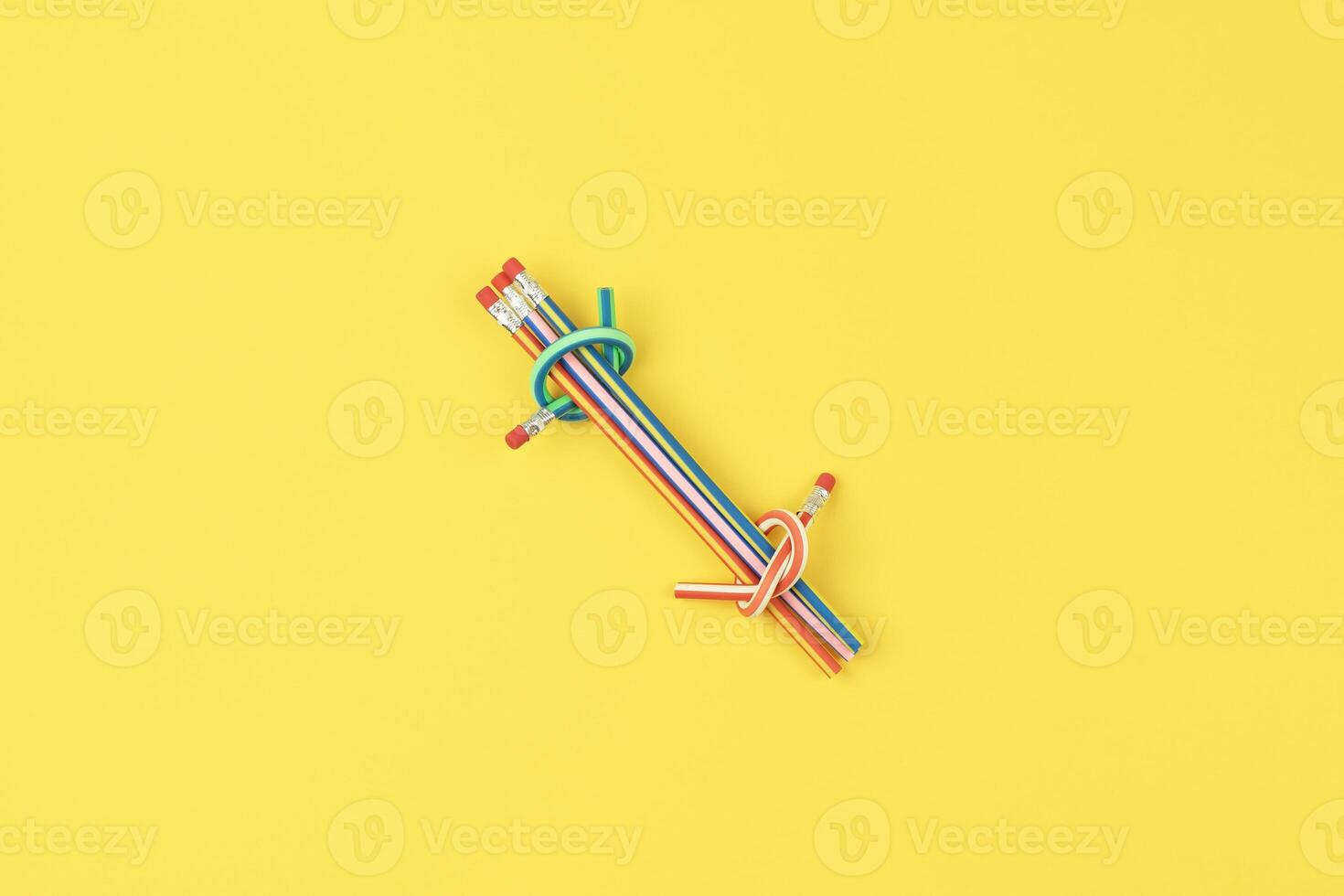 Pencils on yellow surface symbolize pursuit of right solution, solution emerging concept photo