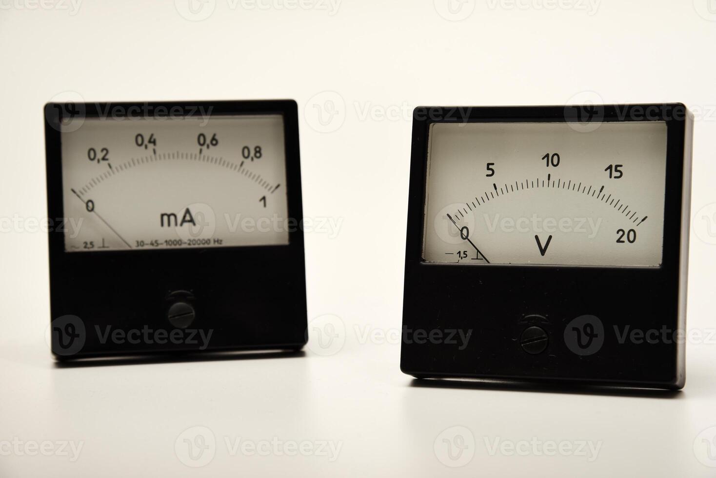 Voltmeter and ammeter on a white background. measuring electric current and voltage. photo