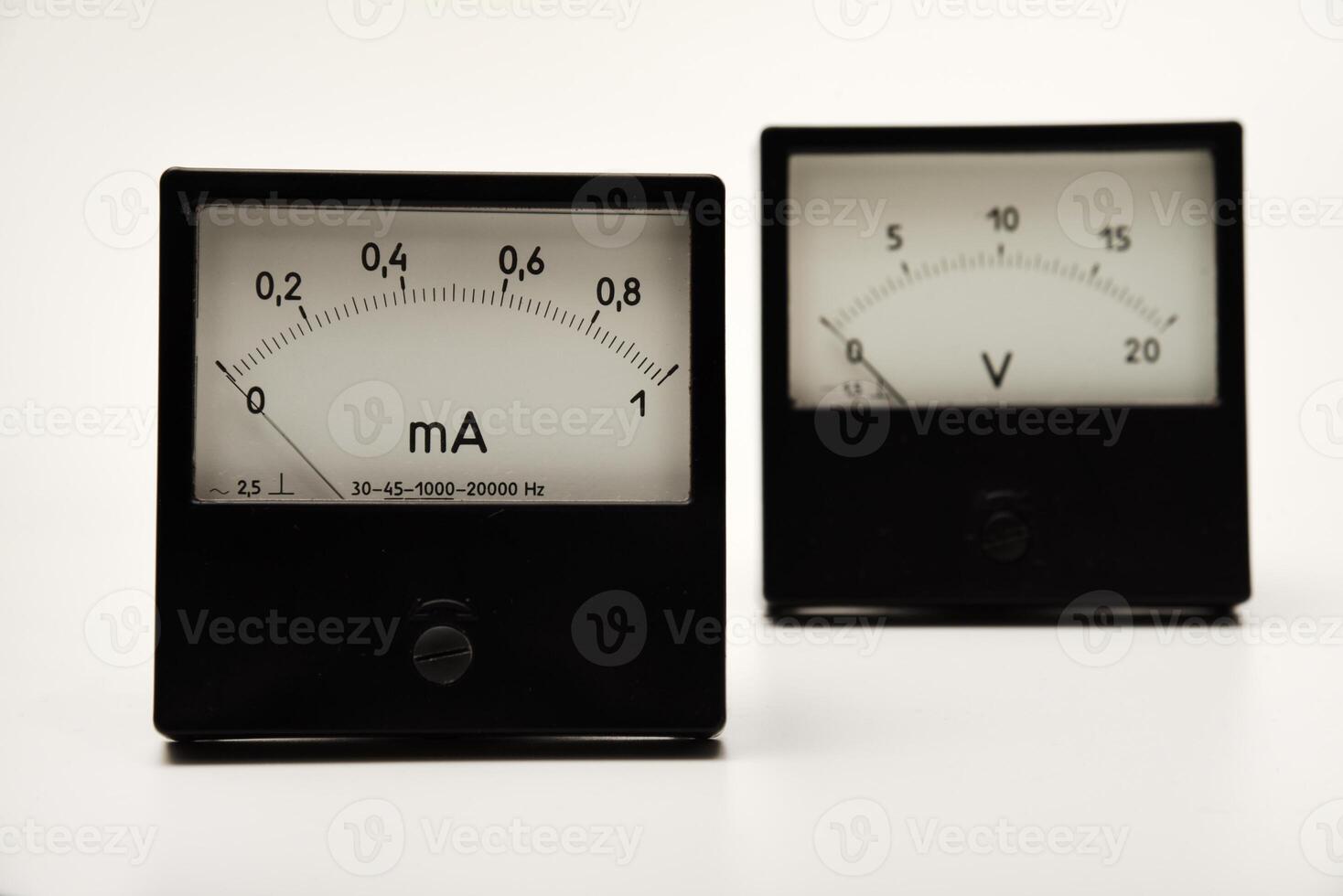A means of measuring electric current and voltage.Voltmeter and ammeter on a white background. photo