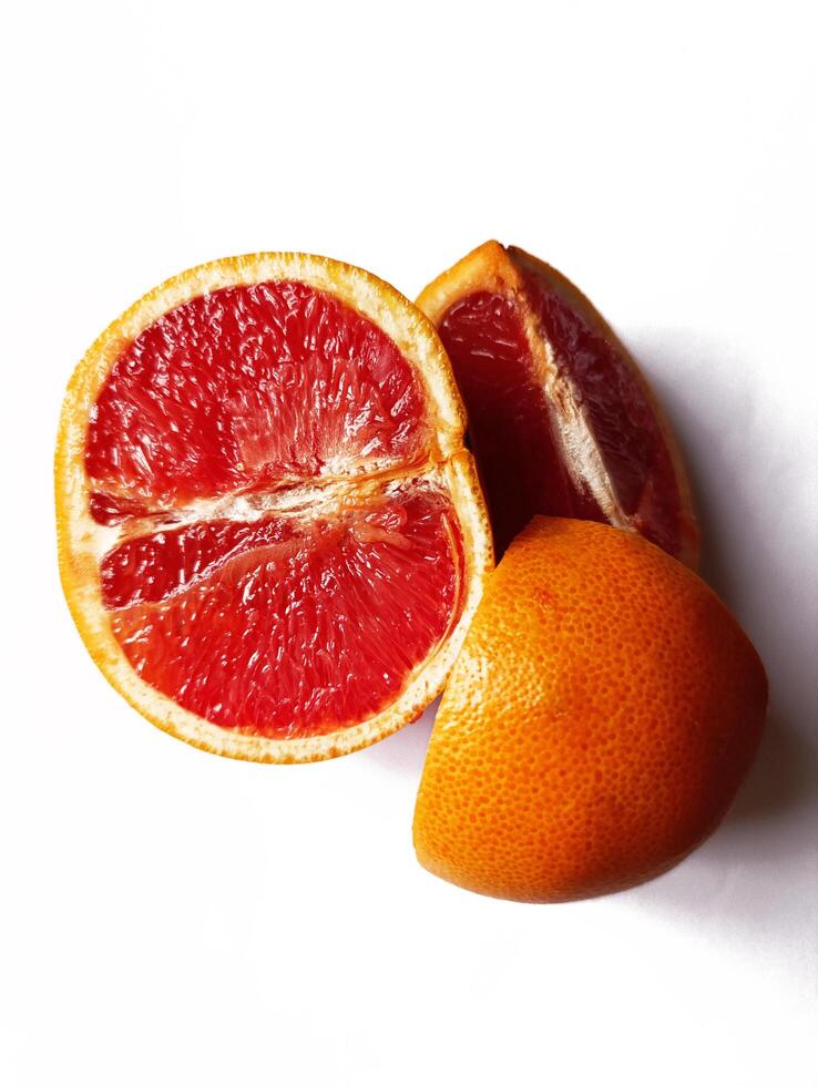 cut grapefruit on the white background photo
