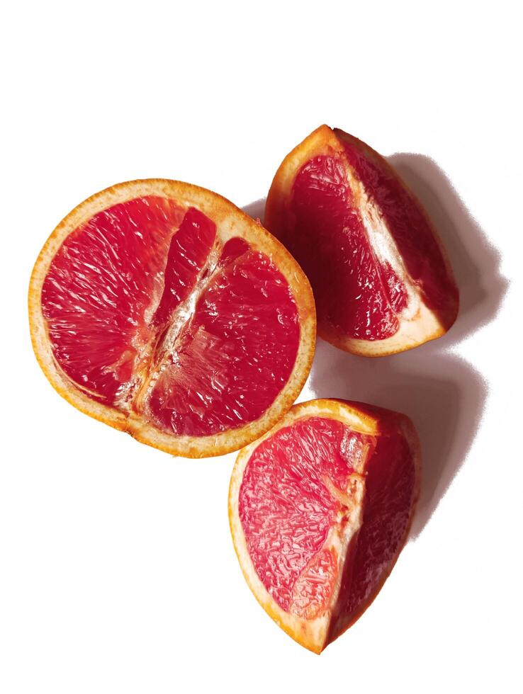cut grapefruit on white background photo