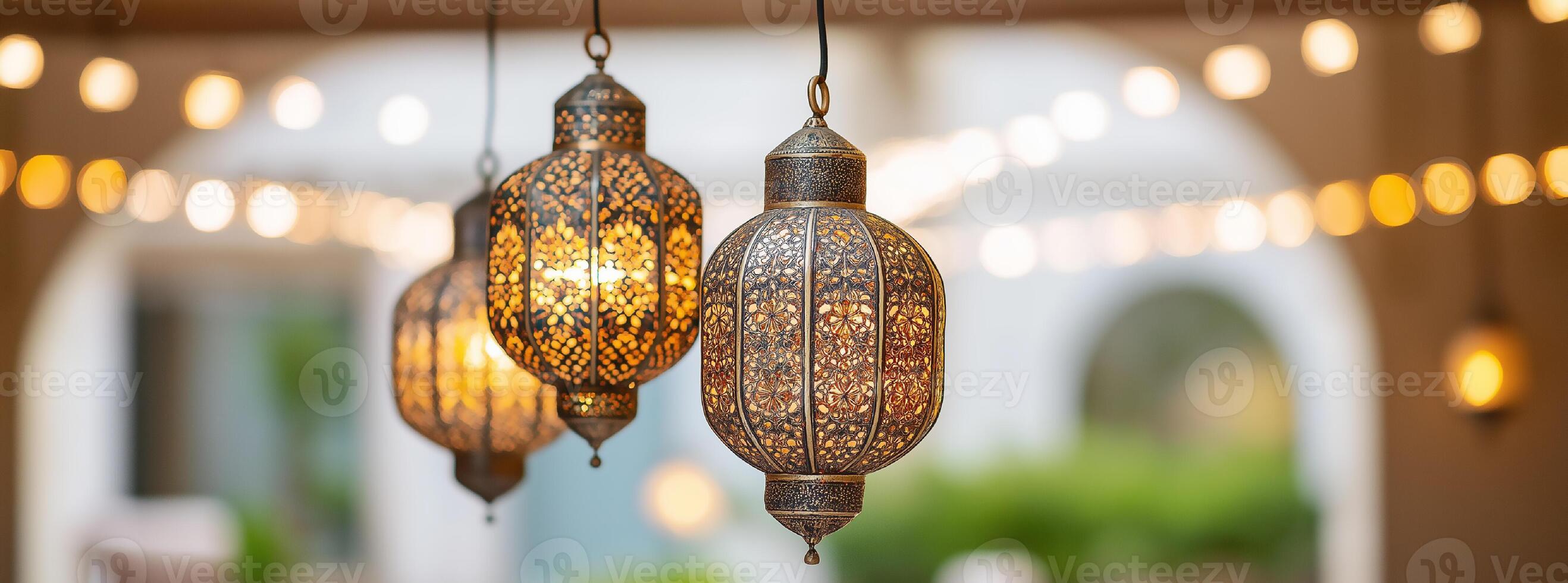 Elegant moroccan lanterns illuminated against soft bokeh lighting at outdoor evening event. Ramadan Kareem photo