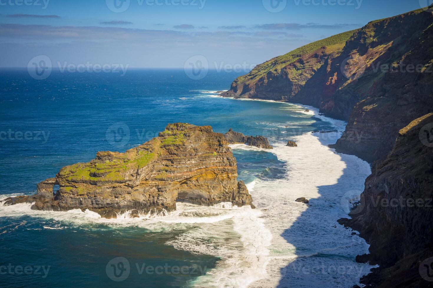 View on Roque de las Tabaibas on the rugged coastline of La Palma, part of Canary Islands of Spain, on Puertito de Santo Domingoto Domingo viewpoint photo