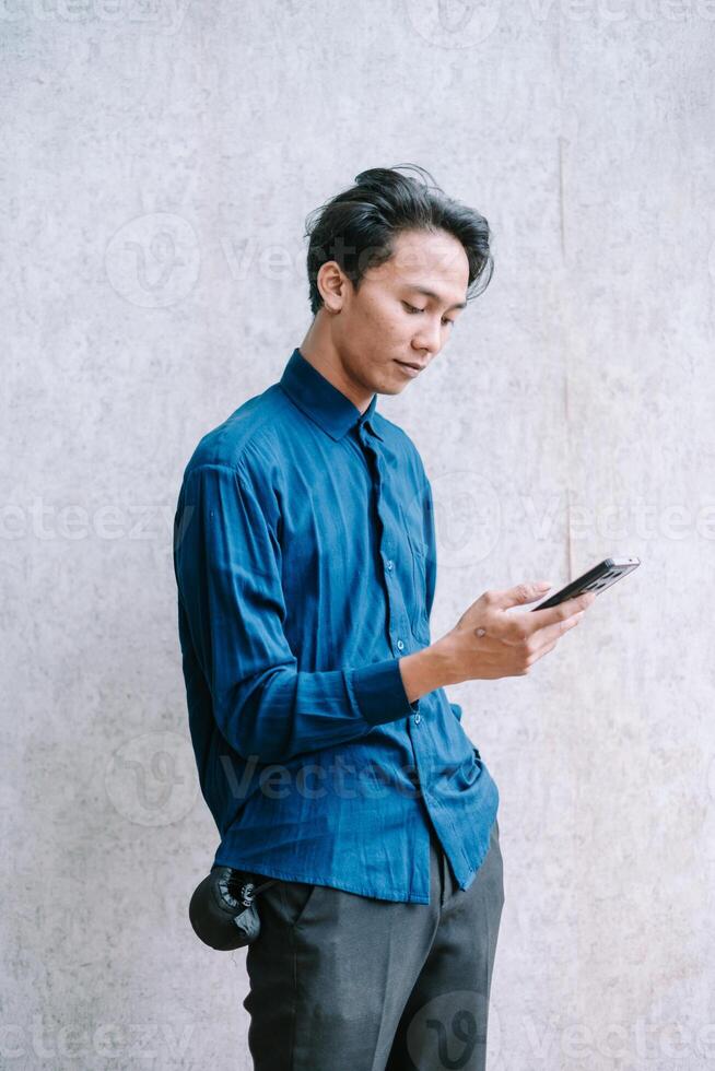 Man Using Mobile App photo