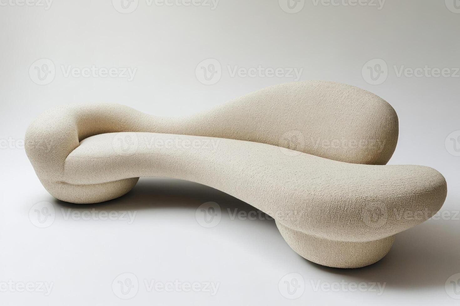 modern sofa with soft flowing lines and upholstery photo