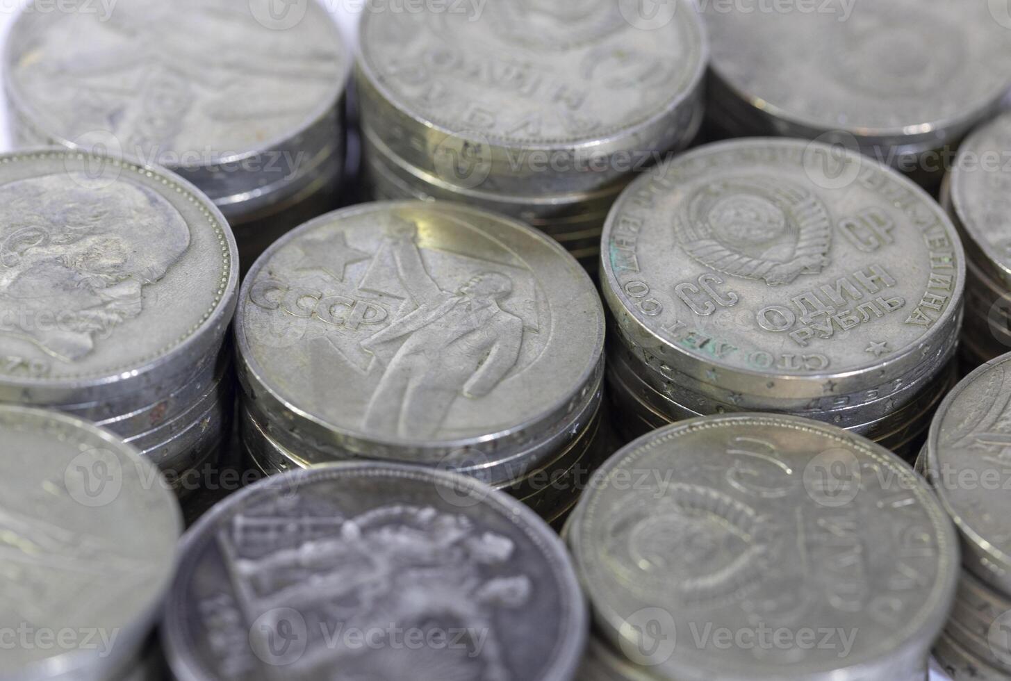 USSR anniversary coins rubles stacked in piles photo