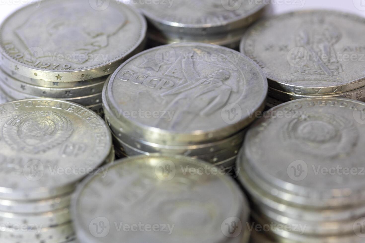 USSR anniversary coins stacked in piles photo
