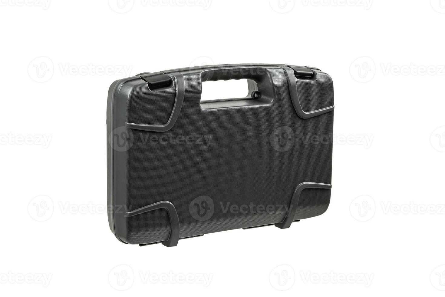 Gray, hard plastic suitcase with textured surface, handle and secure latches photo