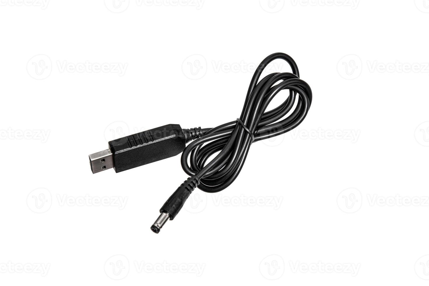 A black USB to DC power cable, isolated on a white background, showing both connectors clearly, useful for charging or powering various electronic devices. photo