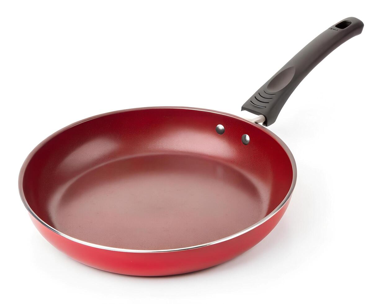 red frying pan isolated on white photo