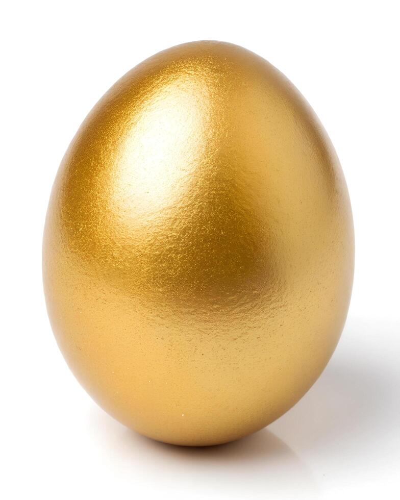 A golden investment egg on a white background photo