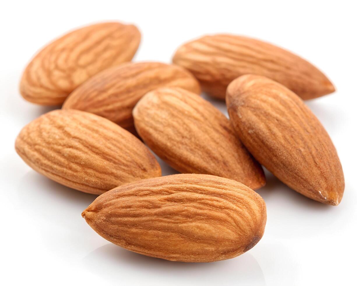 whole brown peeled almonds photo