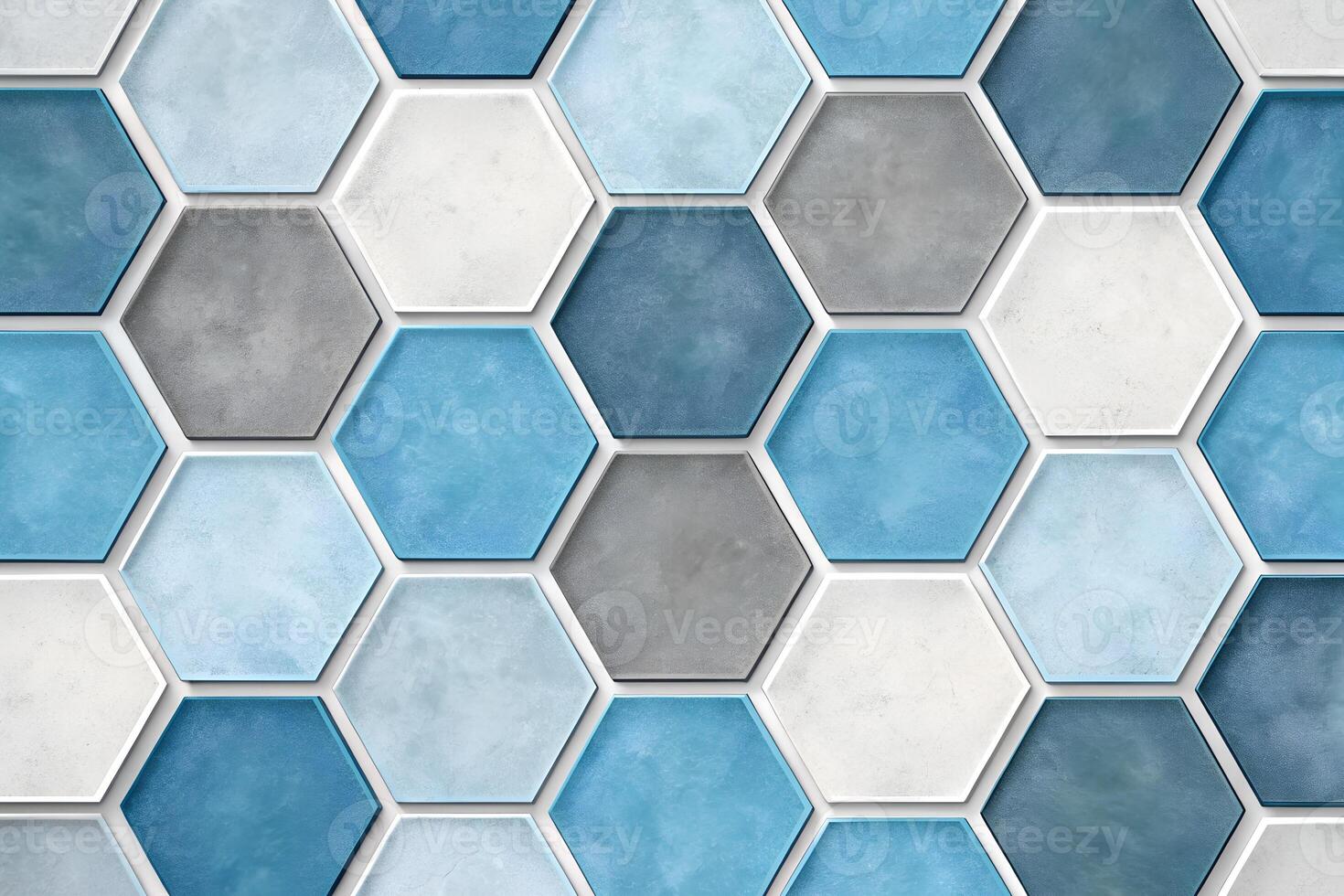 Hexagonal tile pattern in various shades of blue and gray creating a modern wall design for a stylish interior space photo