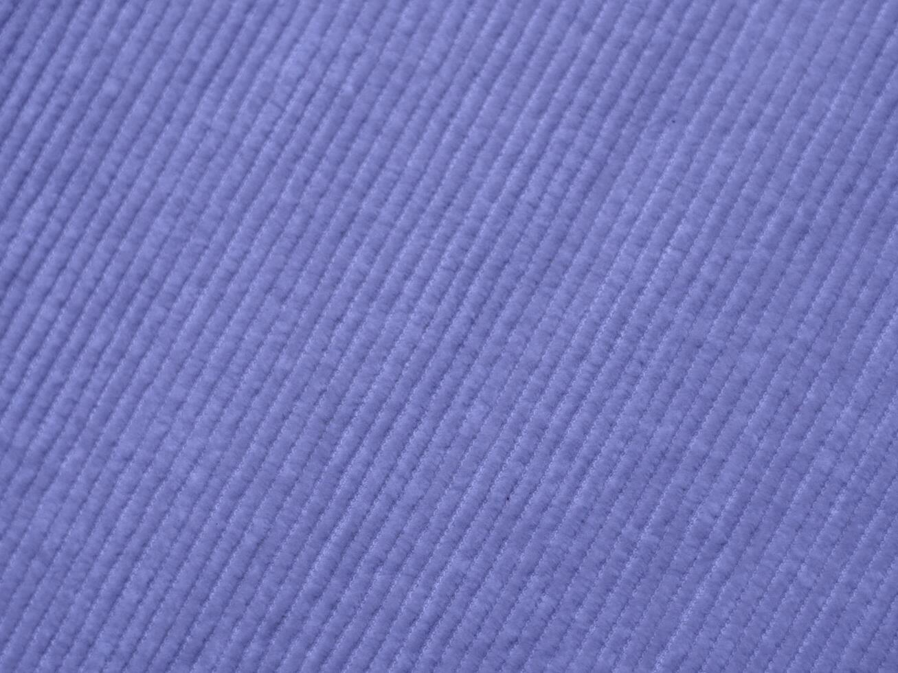A blue fabric with a striped pattern photo