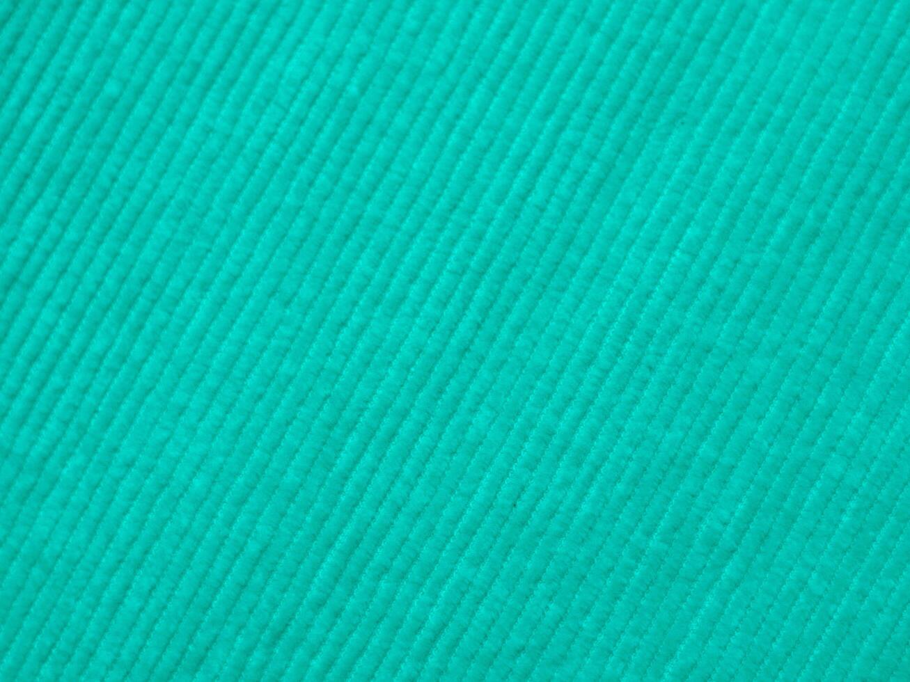 A green shirt with a striped pattern photo