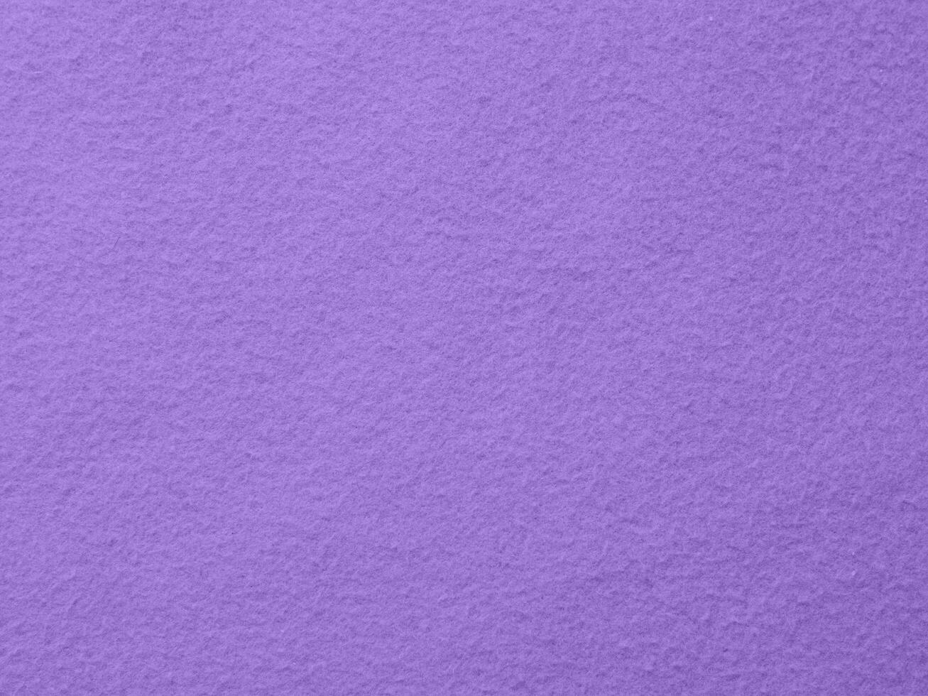 A purple background with a white and black striped pattern photo
