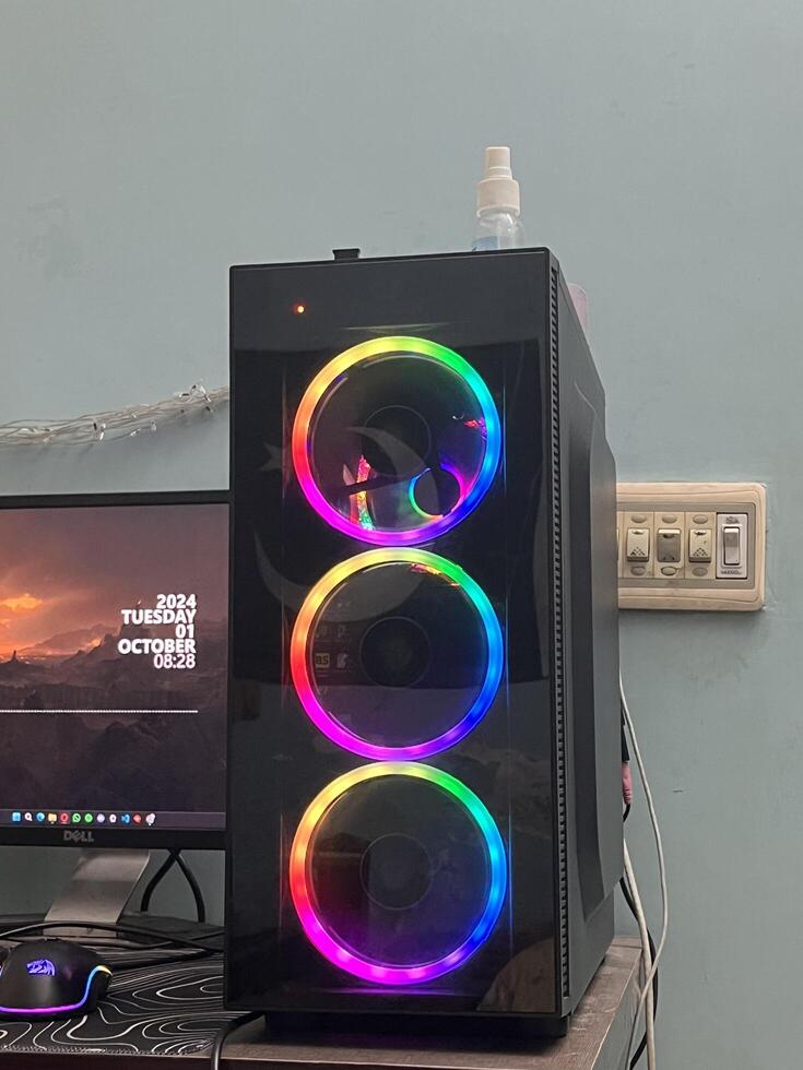 a computer case with colorful lights on it photo