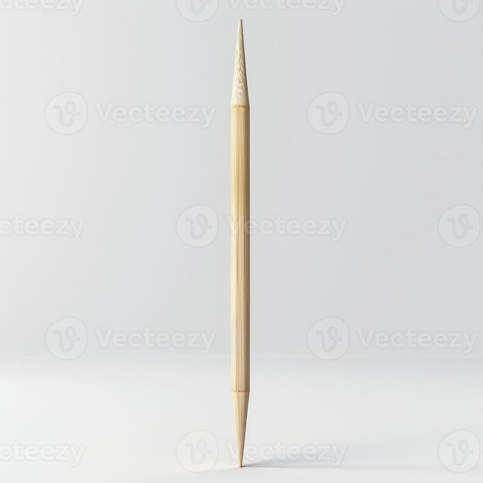 Single wooden pencil standing on white background photo
