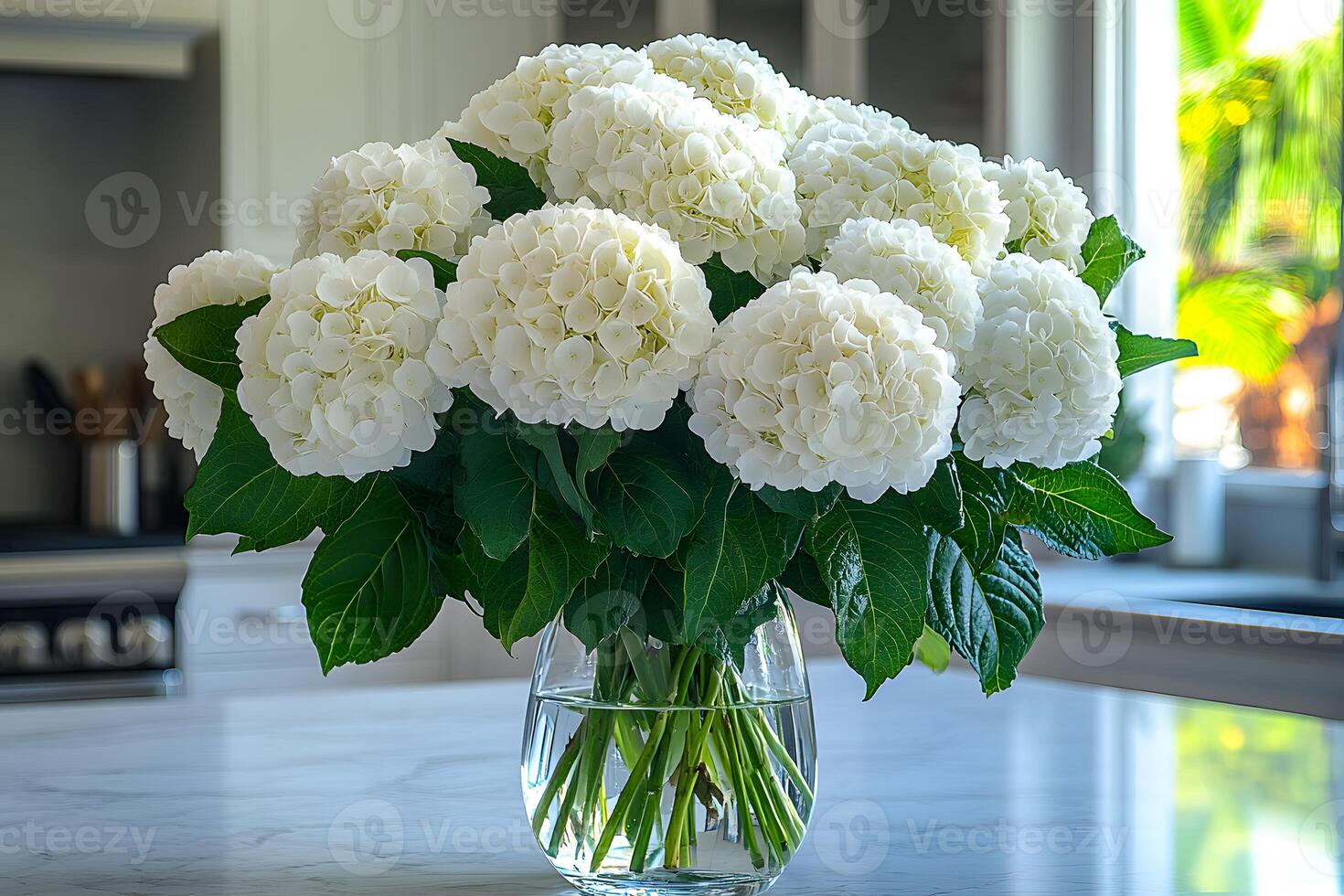 Elegant White Hydrangea Bouquet in Glass Vase for Home Decor and Floral Design Inspiration photo