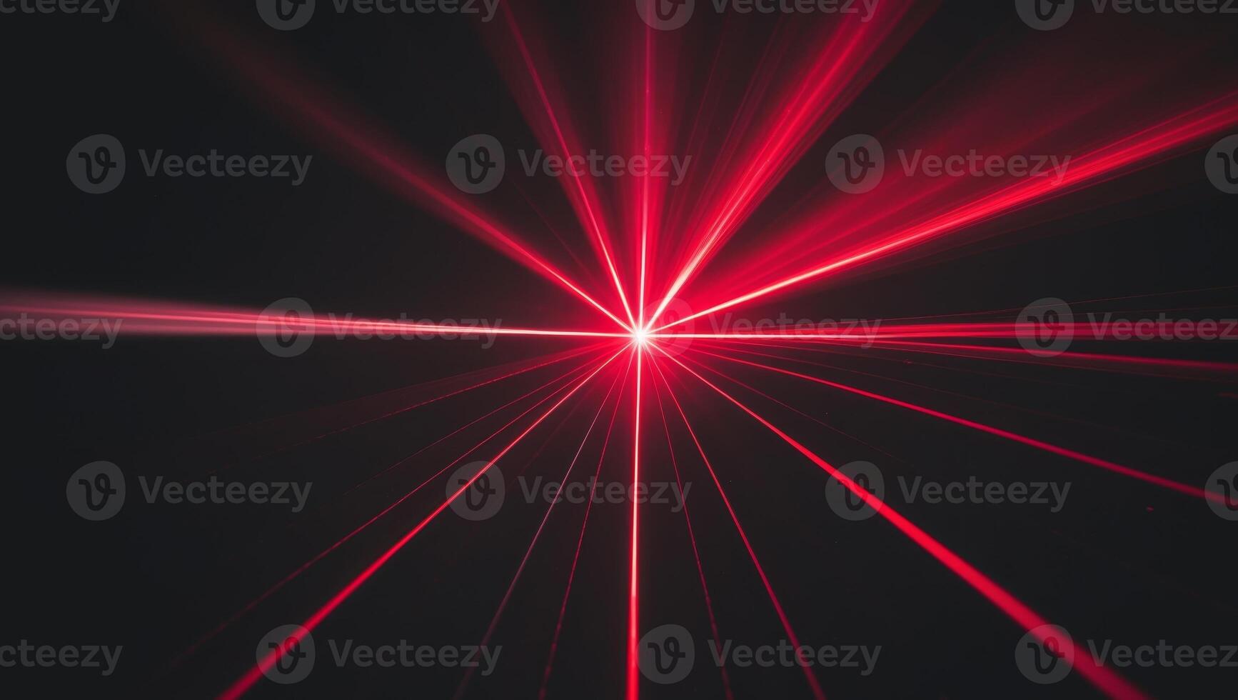 Red laser beam light rays with lens flare on a black background. photo