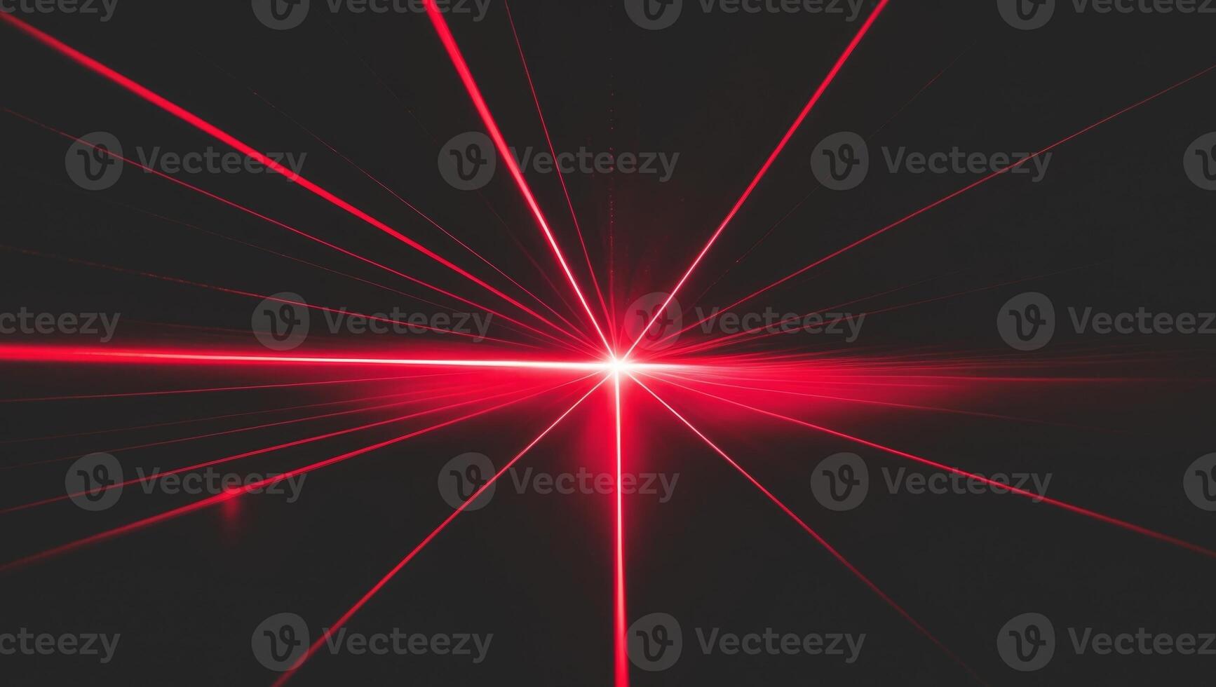 Red laser beam light rays with lens flare on a black background photo